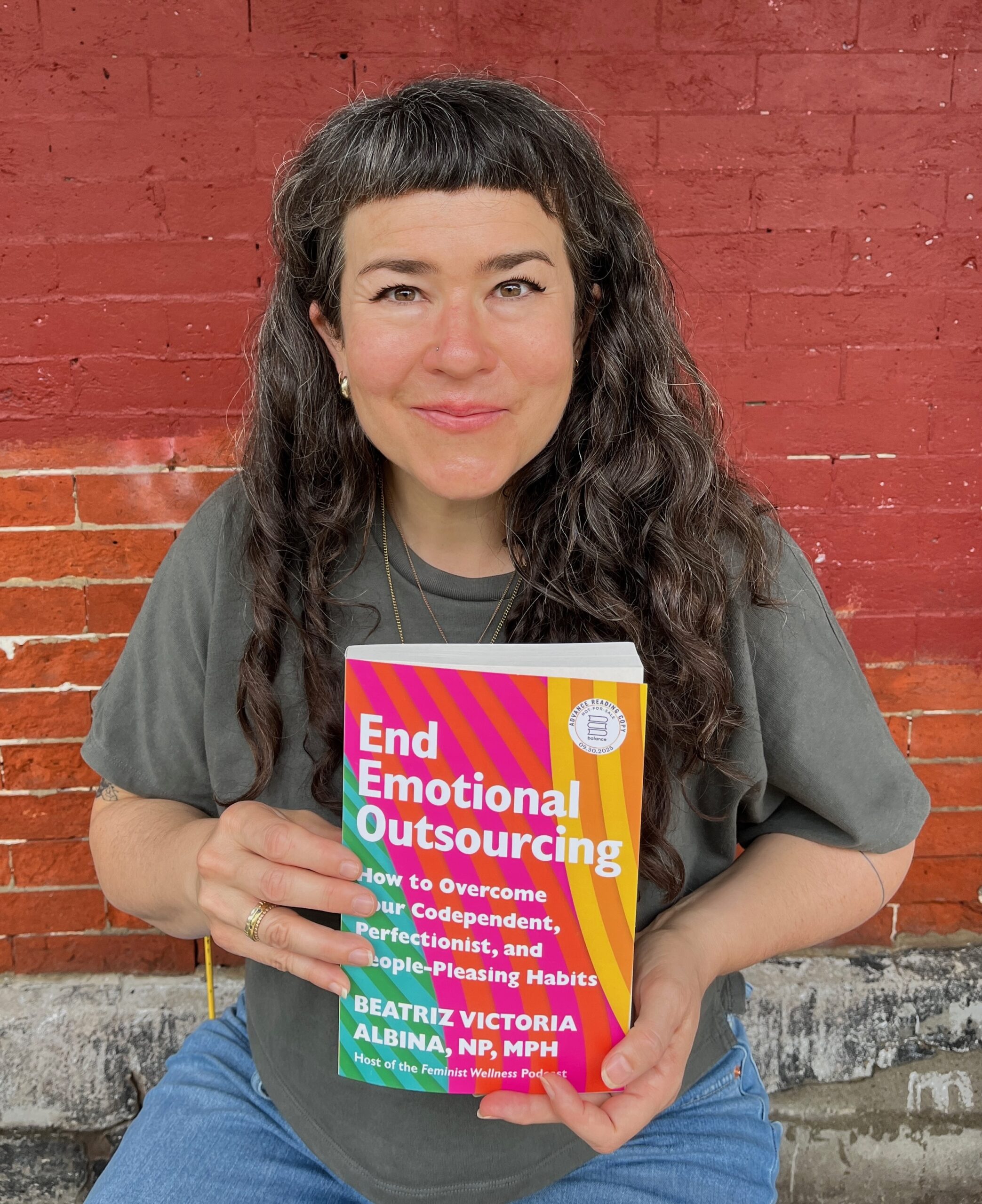 Beatriz Albina with Book